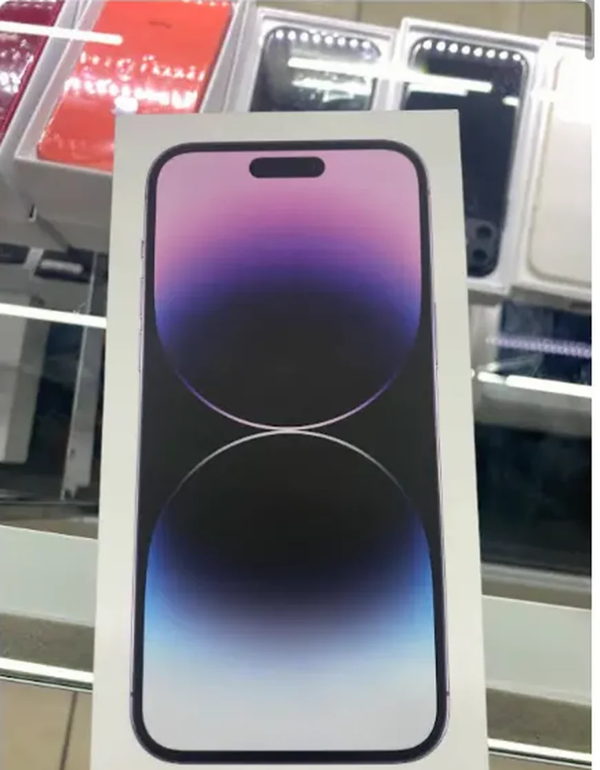Boxed iPhone on the wireless display shelf at Mega Tobacco Vape & Wireless in Scotland Neck NC