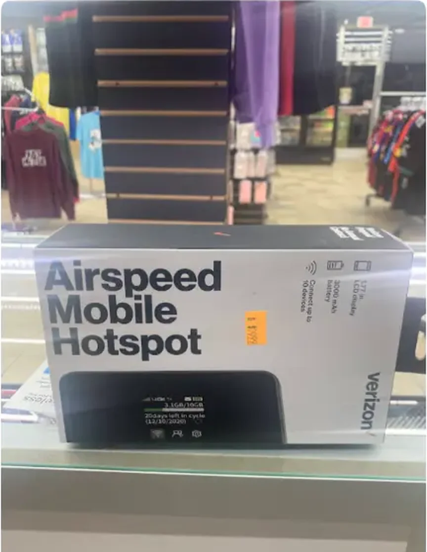 Boxed mobile hotspot device on the wireless display counter at Mega Tobacco Vape & Wireless